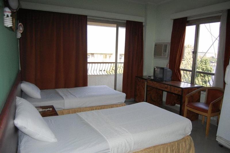 Nile Zamalek Hotel Giza Quarto foto